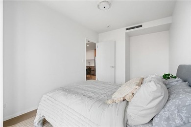 Residence 19H at Bayview Courtyard offers elevated living in a - photo 12
