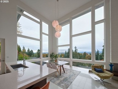 Perched high in the Vancouver Heights, this timeless modern home - photo 6
