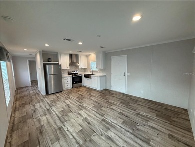 Step into this beautifully maintained Keystone Model by - photo 3