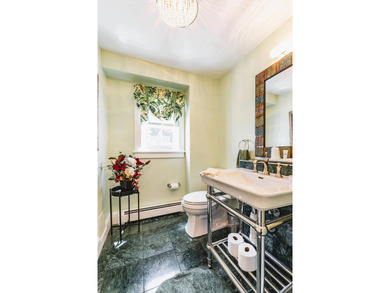 Thoughtfully and extensively renovated, this timeless farmhouse - photo 12