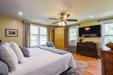 Thoughtfully and extensively renovated, this timeless farmhouse - photo 13
