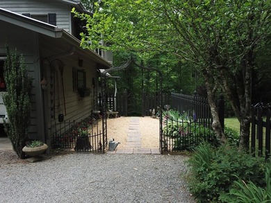 Park Like Setting with gazebo, fishpond and 7 acres of trails - photo 21