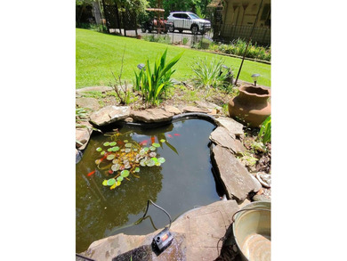 Park Like Setting with gazebo, fishpond and 7 acres of trails - photo 23