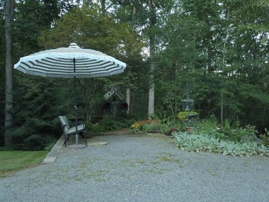 Park Like Setting with gazebo, fishpond and 7 acres of trails - photo 25