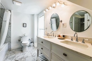 Thoughtfully and extensively renovated, this timeless farmhouse - photo 25