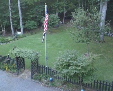Park Like Setting with gazebo, fishpond and 7 acres of trails - photo 29