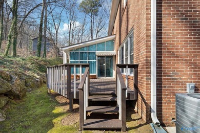 Tucked into the trees on Wyeth Drive in Guntersville, this - photo 40