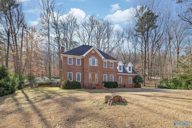 Tucked into the trees on Wyeth Drive in Guntersville, this - photo 43