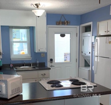 Own a true rental powerhouse in one of West Beach's most - photo 7