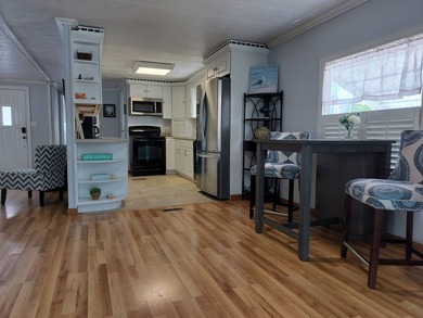 Step into this beautifully remodeled, fully furnished 2-bedroom - photo 11
