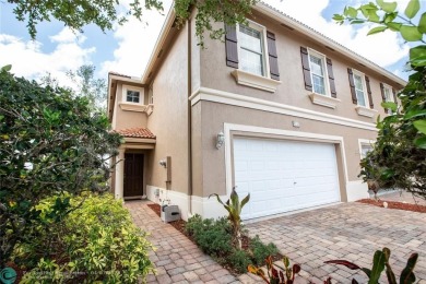 Lake Townhome/Townhouse For Sale in Greenacres, Florida