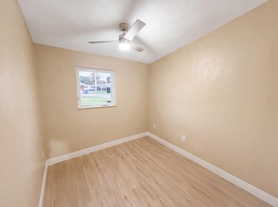 752 Orchid Dr is a 1-story Royal Palm Beach home, gives an open - photo 15