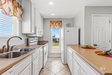 Top-floor corner unit with Gulf views and Little Lagoon views! - photo 9