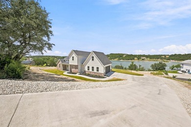 Discover your dream lakeside home featuring almost 300 feet of - photo 3