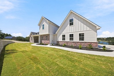 Discover your dream lakeside home featuring almost 300 feet of - photo 4