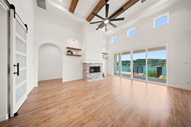 Discover your dream lakeside home featuring almost 300 feet of - photo 5