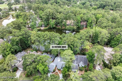 Tucked beneath a canopy of moss-draped oaks in the prestigious - photo 2