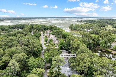 Tucked beneath a canopy of moss-draped oaks in the prestigious - photo 4