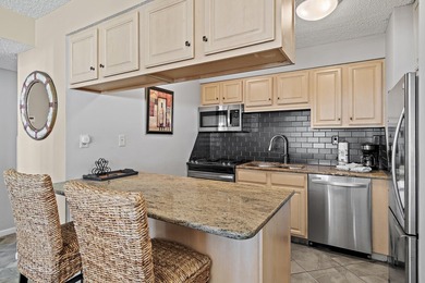 Jetty East is a Gulf front Gated 6-story midrise with under - photo 9