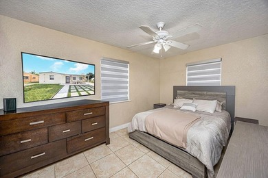 Welcome to this charming single-story residence in Golfview - photo 22