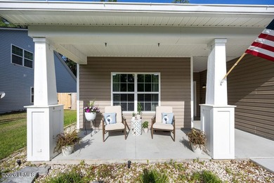Welcome home to this charming Liberty Point property situated on - photo 8