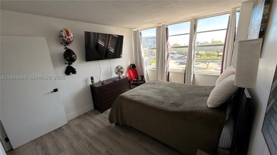 Beautifully updated and move-in ready 2/2 unit in the highly - photo 13