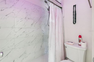 Welcome to this charming townhouse-style condominium located in - photo 15