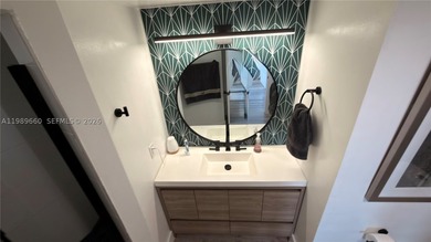 Beautifully updated and move-in ready 2/2 unit in the highly - photo 19