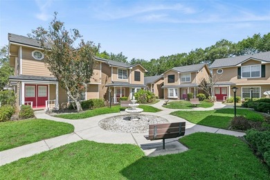 Welcome to this charming townhouse-style condominium located in - photo 19