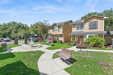 Welcome to this charming townhouse-style condominium located in - photo 20