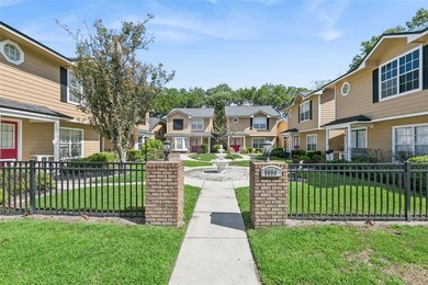 Welcome to this charming townhouse-style condominium located in - photo 21