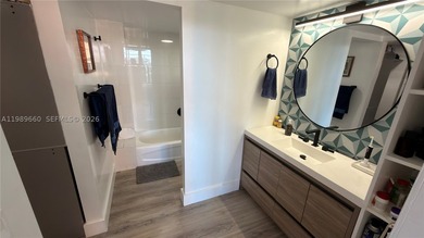 Beautifully updated and move-in ready 2/2 unit in the highly - photo 29