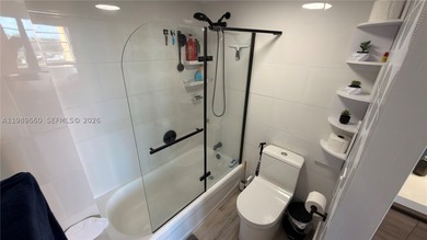 Beautifully updated and move-in ready 2/2 unit in the highly - photo 31