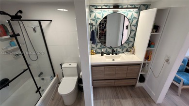 Beautifully updated and move-in ready 2/2 unit in the highly - photo 33