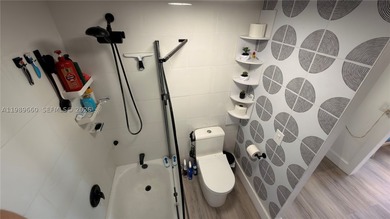 Beautifully updated and move-in ready 2/2 unit in the highly - photo 34