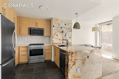 Renovated oversized 1 Bedroom 1.5 Bathroom (easily converts to a - photo 3