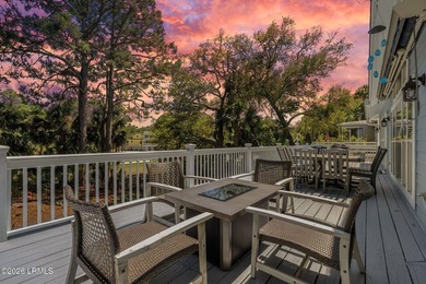 Set on a beautifully manicured half-acre lot overlooking the - photo 2