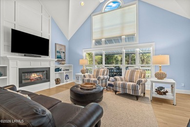 Set on a beautifully manicured half-acre lot overlooking the - photo 3
