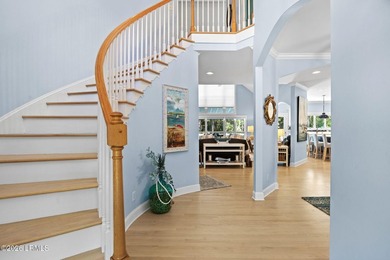 Set on a beautifully manicured half-acre lot overlooking the - photo 8