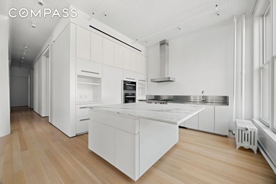 A rare opportunity to own a meticulously renovated three-bedroom - photo 4