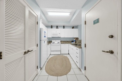 This lovely condo is your ticket to the fabulous beach lifestyle - photo 4