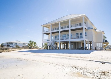 Experience lagoonfront living in Gulf Shores at 2424 West Beach - photo 2