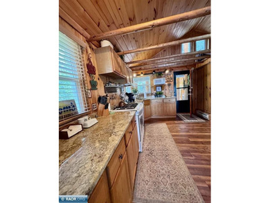 Charming 3 Bedroom Retreat Amidst Towering Pines! This - photo 12