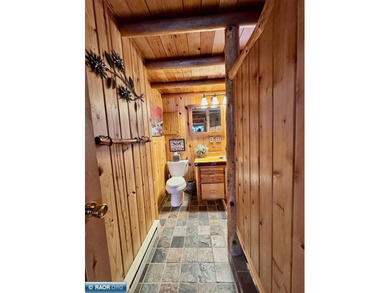 Charming 3 Bedroom Retreat Amidst Towering Pines! This - photo 14