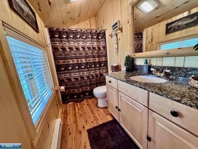 Charming 3 Bedroom Retreat Amidst Towering Pines! This - photo 32