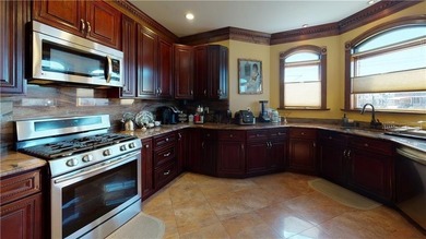 Nestled in the heart of Dyker Heights, this corner detached - photo 41
