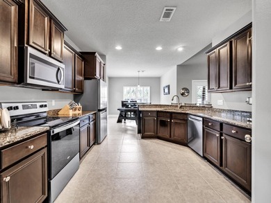 214 Whispering Lake is a beautifully maintained 3 bedroom 2.5 - photo 9