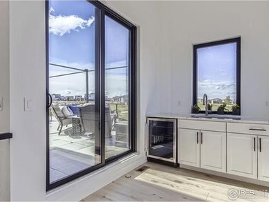 Welcome to elevated Colorado living at its finest. Perched above - photo 16