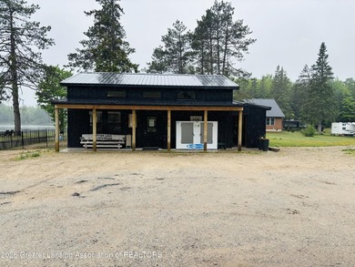 A Rare Upper Peninsula Waterfront Opportunity Established in - photo 9