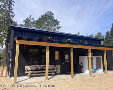 A Rare Upper Peninsula Waterfront Opportunity Established in - photo 10